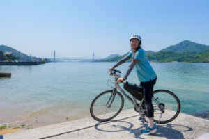 Girl biking on the Shimanami Kaido.