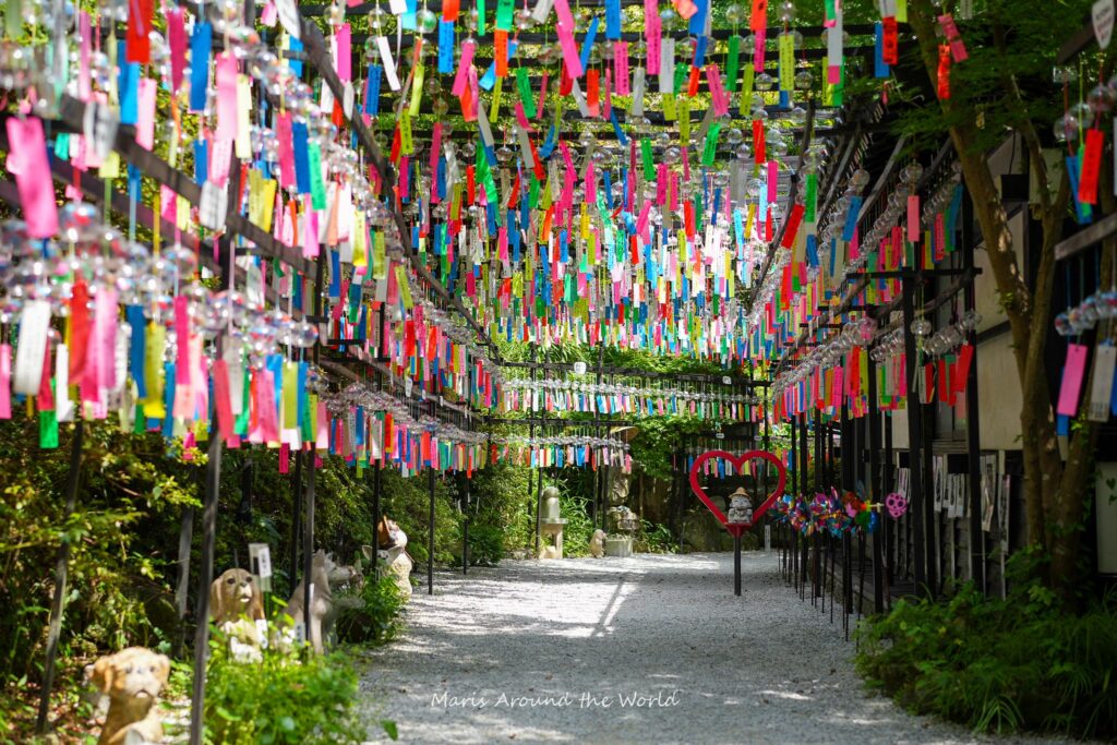 Tunnel of rainbow windchimes.