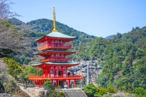 Three-storied pagoda with Nachi Falls.